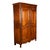 A good antique late 18th century carved French Provincial cherry wood armoire, circa 1780. The armoire having a ogee...