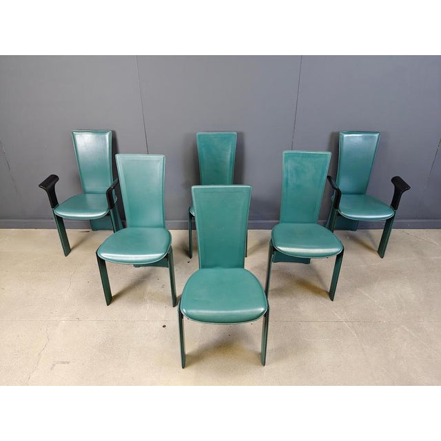 Very chic italian high back dining chairs designed by Pietro Costantini. Elegant curved chairs upholstered with green...