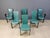 Very chic italian high back dining chairs designed by Pietro Costantini. Elegant curved chairs upholstered with green...