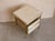 A refined expression of natural mother-of-pearl and brushed brass, the Arcana Bedside Table brings luminous artisanal...