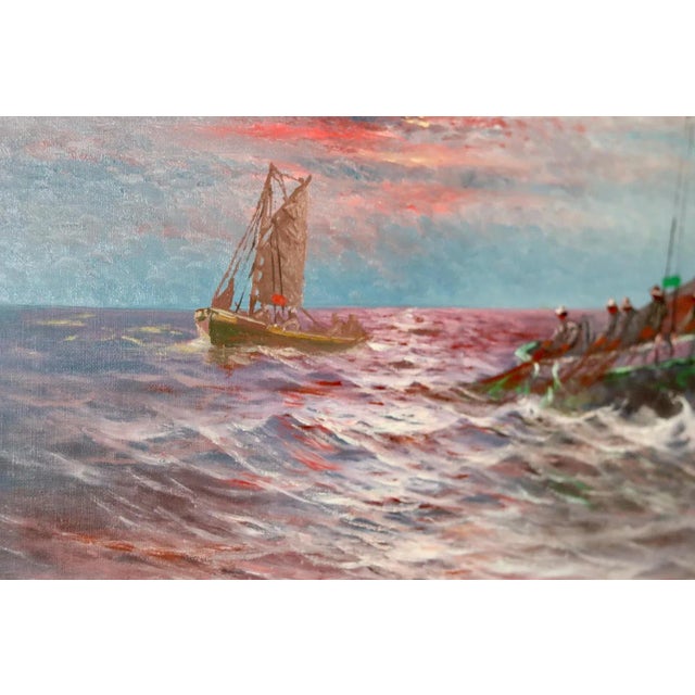 Title: Sailing at Sunset A captivating seascape featuring a sailing boat cutting through choppy waves at sunset. The warm,...
