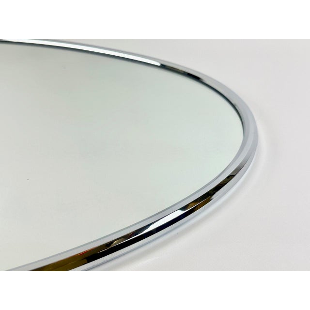 Mid-Century Modern German Nickel-Plated Eliptical Wall Crystal Mirror from Planilux, 1973, in Flawless conditions....