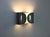 Chrome-plated metal wall lights designed by Afra & Tobia Scarpa. Model: Foglio. Stamped Flos. Wear consistent with age and...