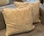 These 20 " square decorative pillows were produced for the Neiman Marcus bedding collection and have down feather filling...
