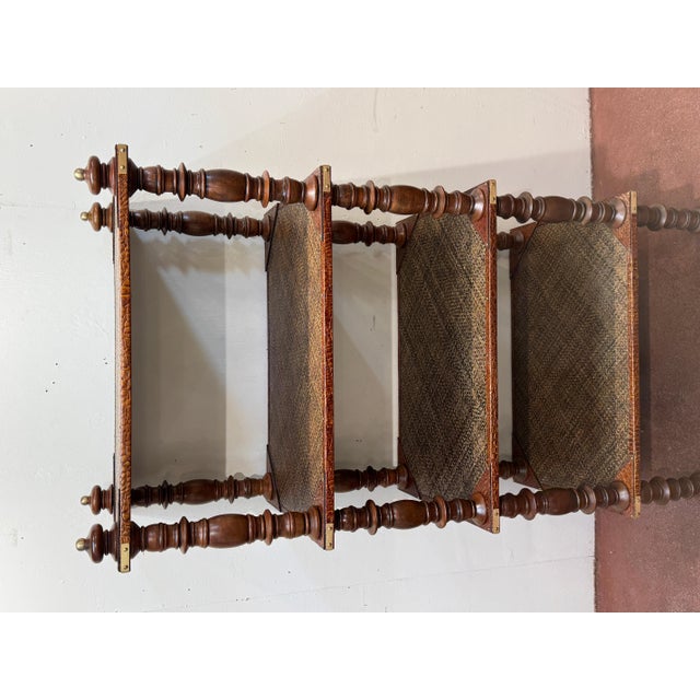 Pair of Four-Tier Anglo-Indian Leather, Brass & Rattan Étagères/Shelves An impressive and richly detailed pair of tall...