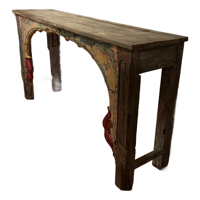 Really fun and unusual, tall, extra colorful carved teak, vintage Indian table. Very heavy.