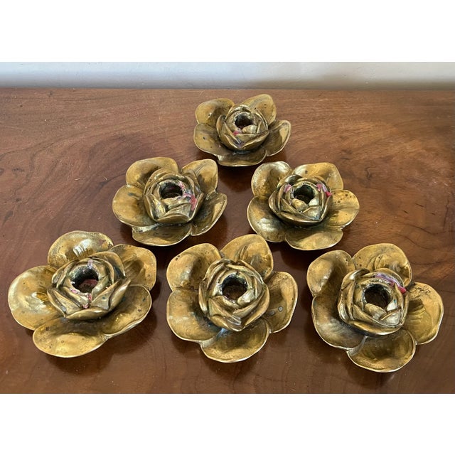 Set of six Italian Mid-Century heavy solid bronze low candle holders in the form of flower heads. Beautiful when scattered...
