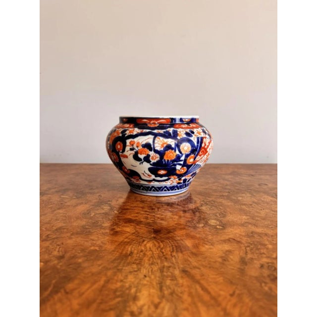 Lovely antique Japanese imari jardiniere, having a lovely antique Japanese imari jardiniere with a bulbous shaped body...