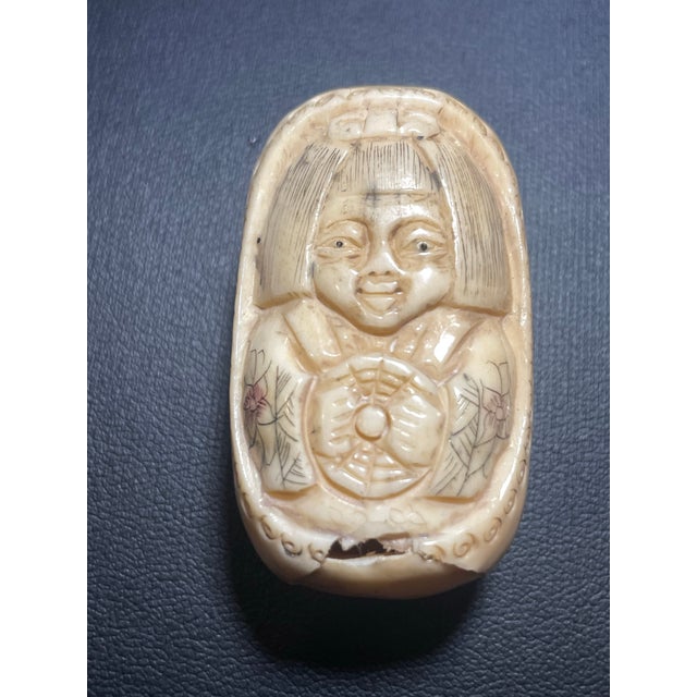Bone Antique Carved Ojime Bead Depicting a Smiling Figure Holding a Coin. 19th Century Japanese Edo Style. For Sale - Image 7 of 7