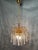 Magnificent Italian chandelier available. Boasting a luxurious waterfall design with cascading layers of shimmering...