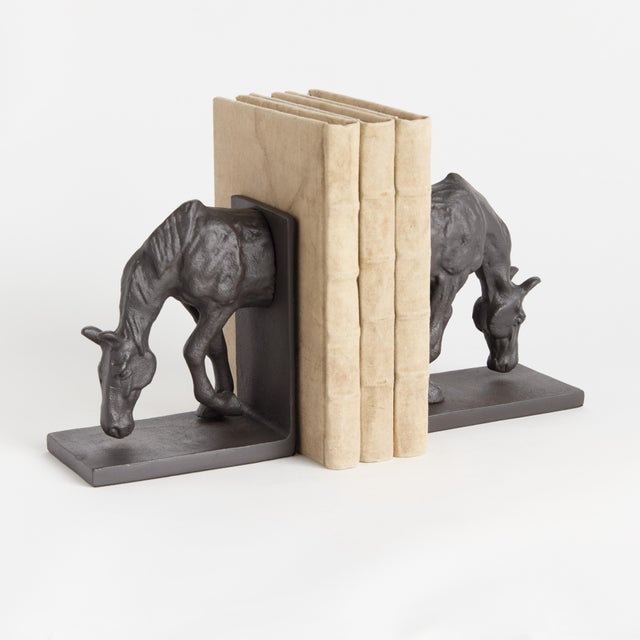 This pastoral handsome creature is created by a cast aluminum sculpting method. A detailed grazing horse bookend design...