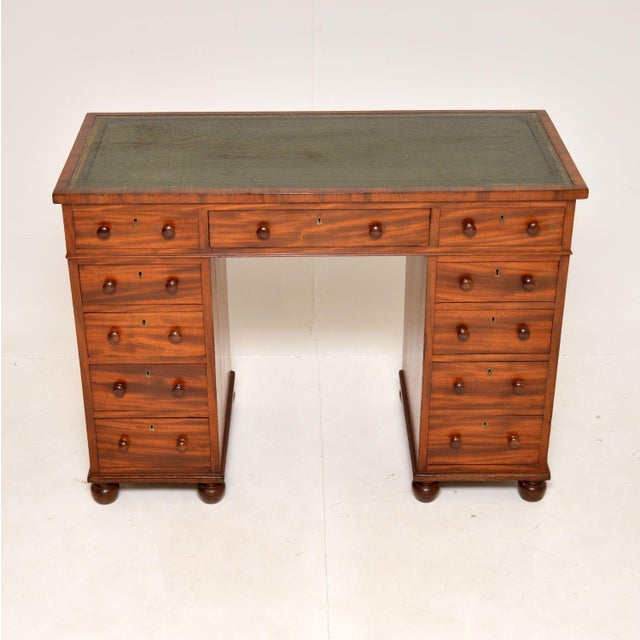 A beautiful and very unusual antique early Victorian architects desk. This was made in England, and I would date it from...