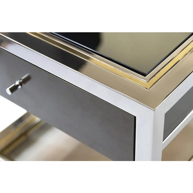 Pair of Italian bedside night stands from 1970's probably by Romeo Rega or Nazaret. The construction is in chrome and...