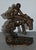Vintage (1930's) Cowboy & Horse Sculpture has a Rustic Style. Made of metal. Bronzed Colored Metal. The Measurements: 5"W...