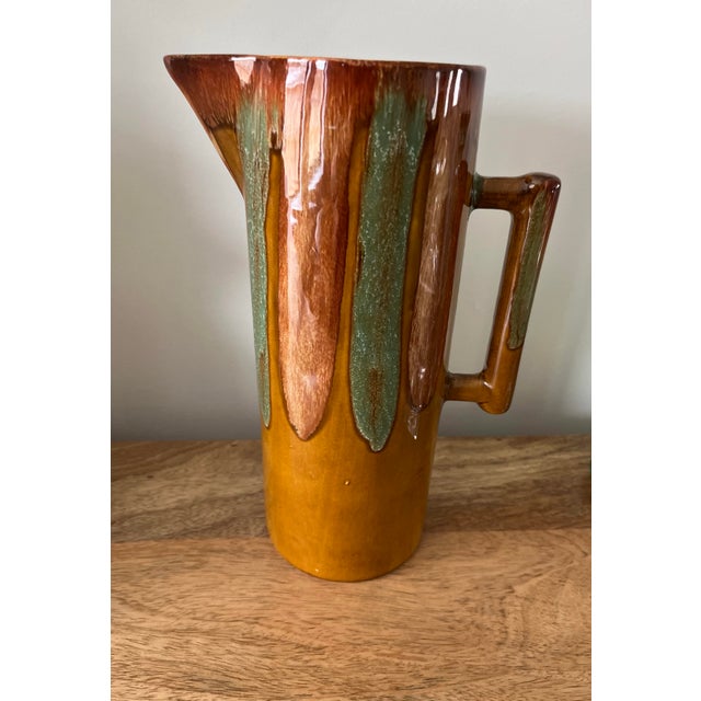 A tall, thin, chimney ewer in the most perfect southwestern color scheme from Dryden.