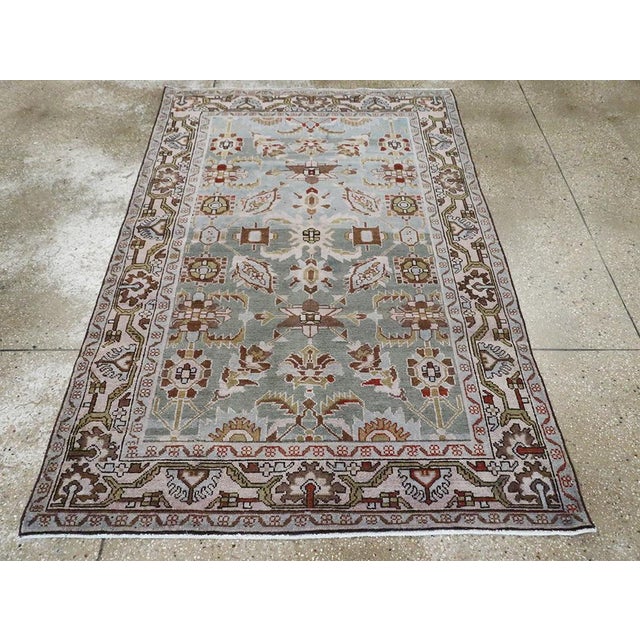 A vintage Persian Malayer accent rug handmade during the Mid-20th century. Measures: 4' 3" x 6' 5"