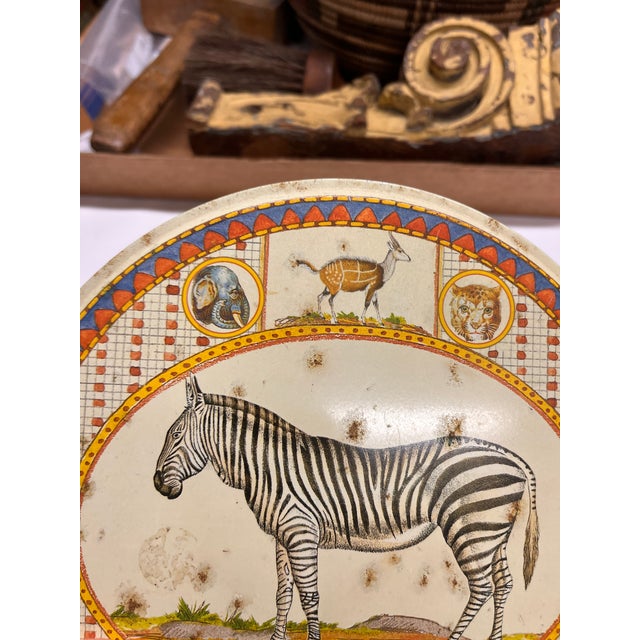 Very charming, well loved Zebra tin for a child's treasures.