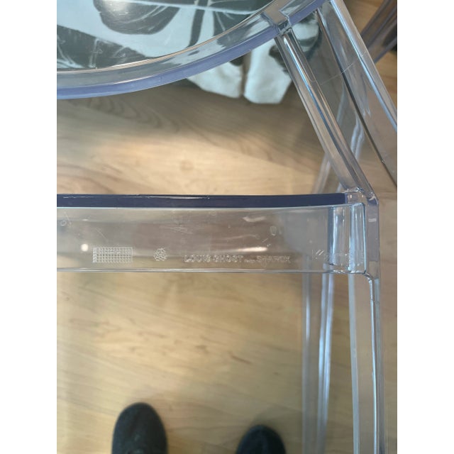 Pair of Louis Ghost chairs by Phillippe Starck for Kartell. Plexiglas. Pure style armchairs. Signed on the rear of seat...