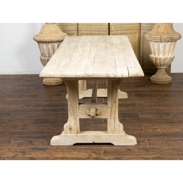 Rustic English 19th Century Natural Wood Farm Table with Trestle Base For Sale - Image 9 of 11