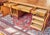 Large and spacious desk made of solid oak with a top decorated with parquetry. This desk made of selected solid oak in...