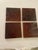 An exceptional, matching set of four (4) antique American art pottery tiles produced by the renowned American Encaustic...