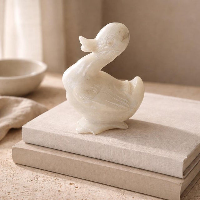 Italian alabaster sculptural bird, hand carved from genuine stone with a soft, creamy patina and beautifully simplified...