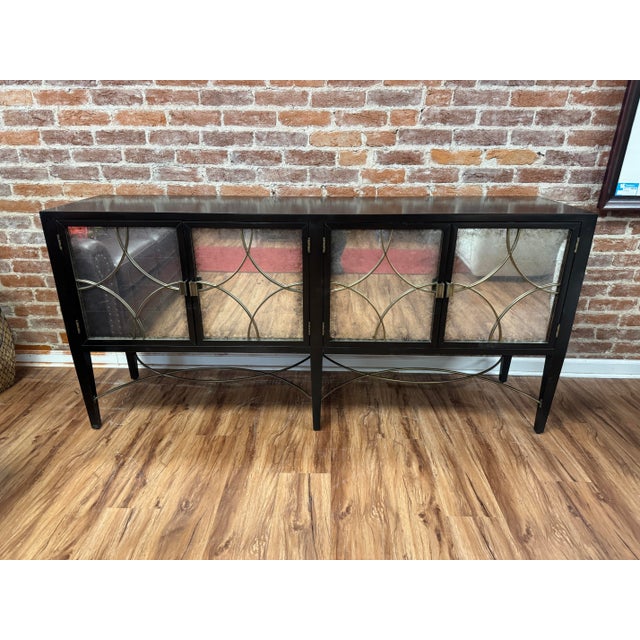 From maker: High Quality Lacquered Buffet or Sideboard with Antiqued Mirrored Doors Opening to Adjustable Shelf Storage,...