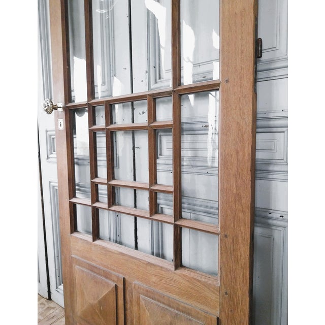 Elegant Art Deco period door, crafted from solid oak, offering both character and authenticity. Its original glazing...