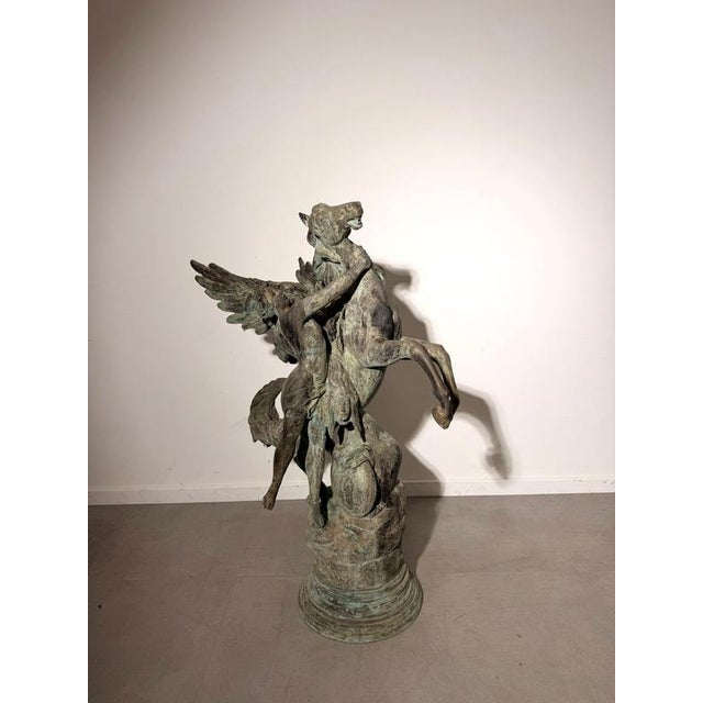 Impressive large-scale decorative sculpture depicting pegasus, the mythical winged horse, together with a winged classical...