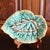 A robustly modeled and textured English majolica begonia leaf plate edged in ochre, with a green and umber center. Good...