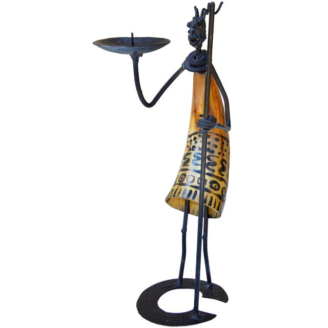 We love how this stunning one-of-a-kind vintage West-African candleholder figurine looks. Measuring 13.25" tall, an...