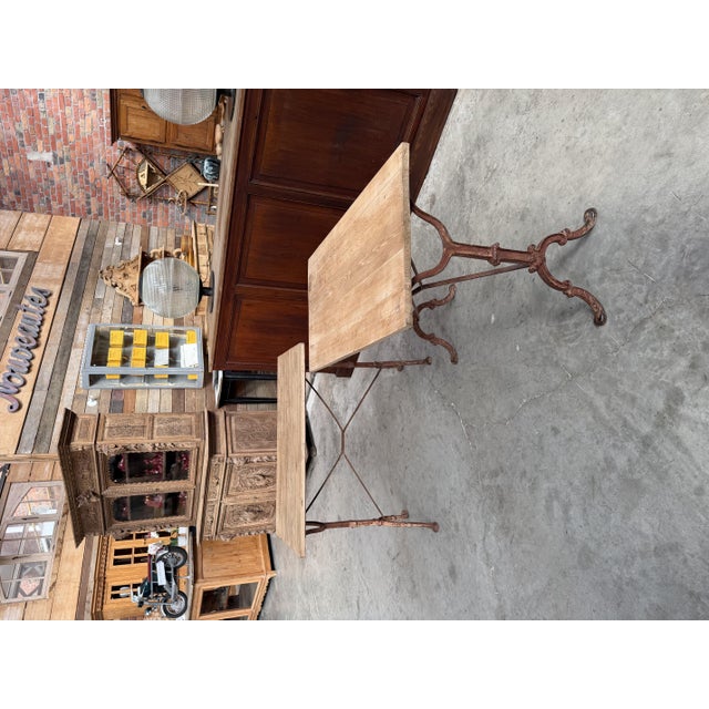 These vintage bistro tables have been fully restored. They feature a raw oak tabletop and a cast-iron base that has...