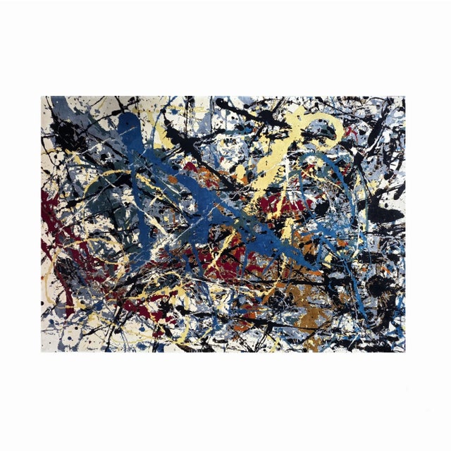 Transform your interior with this exceptional artisanal rug, a unique creation inspired by the iconic style of Jackson...