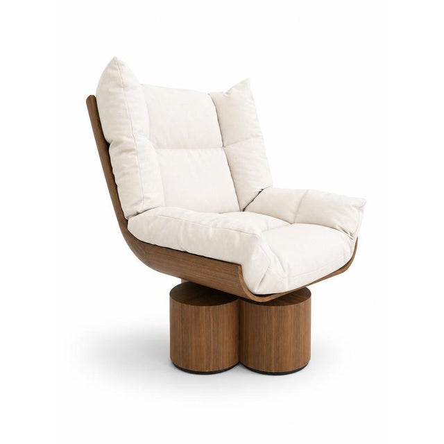 Caz swivel armchair in walnut and suede leather by christophe perichon. Dimensions: w 120 x d 90 x h 110 cm. Materials:...
