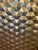 Eye catching impressive large square relief wall art having raised geometric op art pattern out of carved wood or metal,...