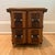 A charming early 20th‑century oak sewing cabinet featuring four deep drawers, decorative applied burled wood faces, and...