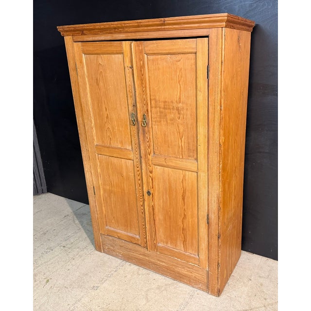 A 19th Century Antique Pine double door Cupboard, probably a larder cupboard or from a school originally but now would...