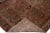 Beautiful vintage Persian distressed hand-knotted wool rug with a brown color field. This piece has a pink and beige...