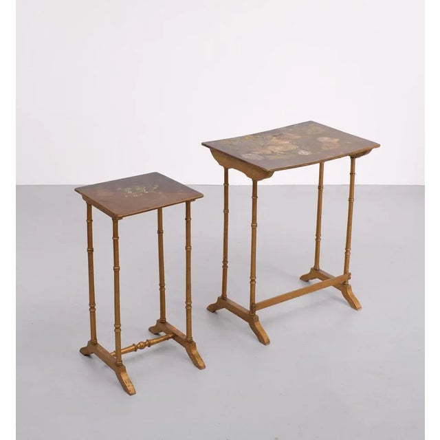 Two very nice Art Nouveau side table. Hand painted Flowers on the tops. These tables are in a distressed condition. In a...