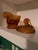 This is a vintage pressed amber glass lidded dish shaped like a turkey, frequently attributed to the LE Smith Glass...