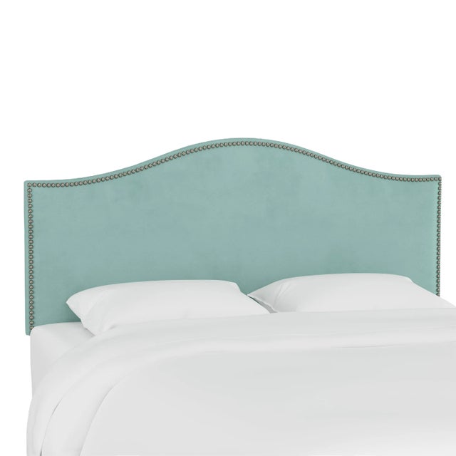 Give your interior a lift with the Headboard. Featuring the delicate curves of a classic camelback design, with subtle...