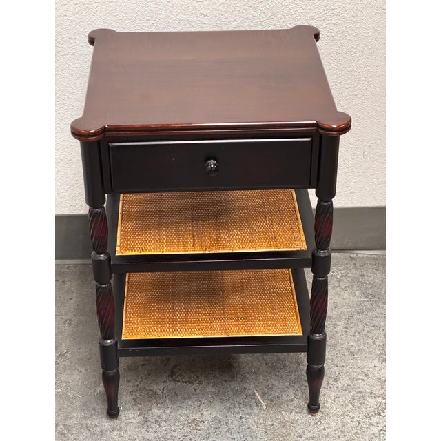 Design Plus Gallery presents a Colonial Revival Turned Leg Cane Side Table with Drawer. This side table combines a...