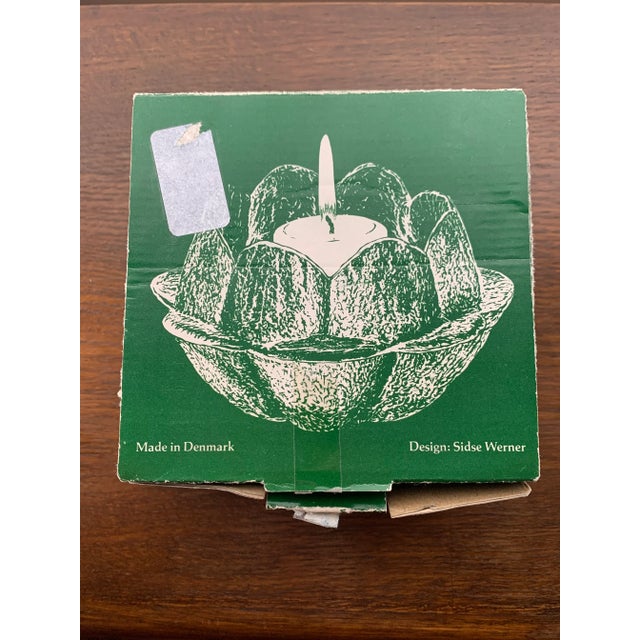 “Lotus” glass candle holder duo by Holmegaard, Danmark, 1970 Design by Sidse Werner Dimensions: Small candle holder:...