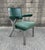 Mid-Century Steelcase aluminum arm chair with original green fabric and vinyl upholstery. This vintage Industrial Chair is...