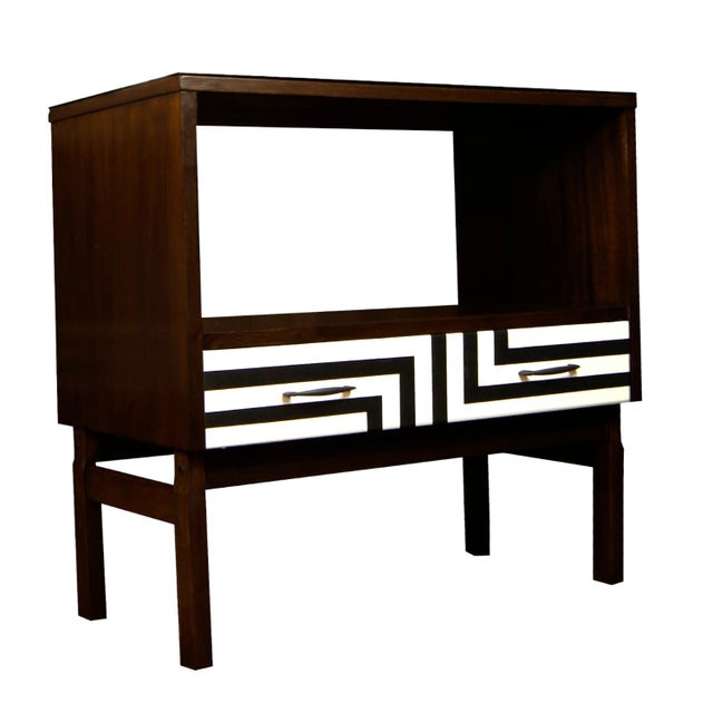 A cabinet of many uses: table, tv cabinet, for record player and vinyls, bookcase, bedside table… a spacious drawer with...