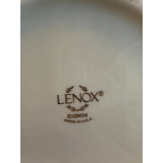 Beautifully crafted hand painted ivory 10.5" vase featuring an embossed design and gorgeous floral pattern, the elegant...