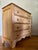 Restored late 19th century Pennsylvania scrubbed pine chest of drawers with four even sized drawers and wooden knobs. All...