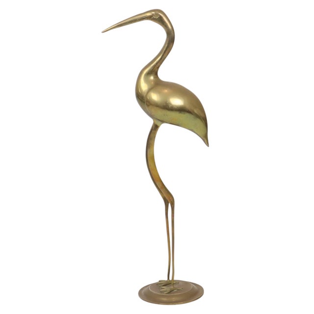 A magnificent, large brass crane or ibis—XL size—crafted from yellow copper (brass) and featuring a beautiful aged patina;...