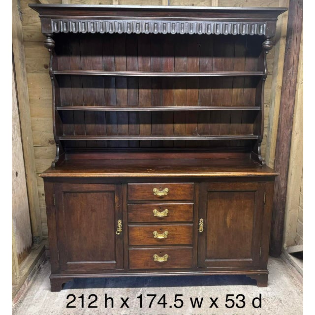 A good looking Welsh Oak Dresser dating to the mid 19th Century. Having 4 smoothly running drawers and 2 cupboards to the...