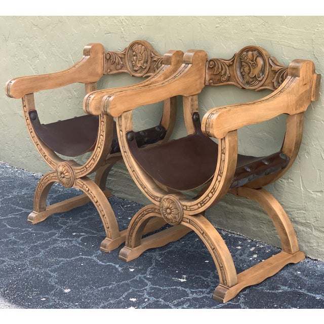 About 19th century Italian hand carved walnut Savonarola chair, circa 1880. Having wonderfully carved frame with scrolling...